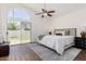 Relaxing main bedroom with a sliding glass door leading to the backyard at 2137 E New Bedford Dr, Gilbert, AZ 85234
