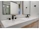 Bathroom with double sink vanity and modern fixtures at 2203 E Crest Ln, Phoenix, AZ 85024