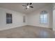 Spacious bedroom with shuttered windows and modern ceiling fan at 2203 E Crest Ln, Phoenix, AZ 85024