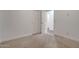 Bedroom featuring carpeted floors and closet with sliding doors at 2203 E Crest Ln, Phoenix, AZ 85024