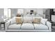Bright, open-concept living space with modern white sofas and neutral décor at 24270 W Chanute Pass, Buckeye, AZ 85326
