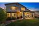 This backyard has grass, a covered patio, and an outdoor kitchen at 3123 E Buena Vista Dr, Chandler, AZ 85249