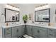 Elegant bathroom showcasing dual sinks, granite countertops and modern fixtures at 3123 E Buena Vista Dr, Chandler, AZ 85249