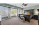 Spacious bedroom featuring a ceiling fan, many windows, and ample natural light at 3123 E Buena Vista Dr, Chandler, AZ 85249