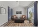 Cozy living room showcasing comfortable leather seating and ample natural light at 3123 E Buena Vista Dr, Chandler, AZ 85249