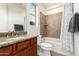 Bathroom vanity with granite countertop and nearby shower-tub combination at 31502 N 58Th Pl, Cave Creek, AZ 85331