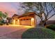 Charming house with a three-car garage, stone accents, and a well-maintained driveway at 31502 N 58Th Pl, Cave Creek, AZ 85331