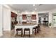 Spacious kitchen with a large center island, stainless steel appliances, and ample seating at 31502 N 58Th Pl, Cave Creek, AZ 85331