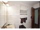 Small bathroom with patterned wallpaper, a vintage mirror, and a white curtain at 3202 W Joan De Arc W Ave, Phoenix, AZ 85029
