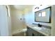 Updated bathroom with a modern vanity, granite countertop, and walk-in shower at 3708 W Peoria Ave, Phoenix, AZ 85029