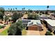 Aerial shot showing a well-maintained house with solar panels and lush landscaping at 3708 W Peoria Ave, Phoenix, AZ 85029