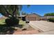 Attractive home with a cozy front yard and a well-kept lawn, presenting a welcoming and serene outdoor space at 3708 W Peoria Ave, Phoenix, AZ 85029