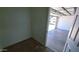 Garage space with open door, with partial view of the driveway at 3708 W Peoria Ave, Phoenix, AZ 85029