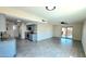 Bright living room with modern flooring leading to the kitchen and outdoor space, perfect for entertaining at 3708 W Peoria Ave, Phoenix, AZ 85029