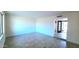 Spacious living room with ample natural light and new flooring, ideal for comfortable living and entertaining guests at 3708 W Peoria Ave, Phoenix, AZ 85029