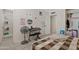 Bedroom featuring a fan, keyboard, and a shower room at 4026 W Berridge W Ln, Phoenix, AZ 85019