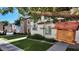 Well-manicured lawn and trimmed bushes give this home an inviting look at 4169 E Jasper Dr, Gilbert, AZ 85296