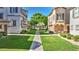 Serene neighborhood view showcasing lush green lawns and a peaceful walkway at 4169 E Jasper Dr, Gilbert, AZ 85296