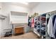 Walk-in closet with shelving and hanging storage to maximize organization and space at 42709 W King Fisher Dr, Maricopa, AZ 85138