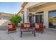 Inviting covered patio features comfortable seating, perfect for relaxing and entertaining outdoors at 4297 S Pony Rider Trl, Gold Canyon, AZ 85118