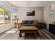 Cozy living room with wood floors and stylish furnishings at 4297 S Pony Rider Trl, Gold Canyon, AZ 85118