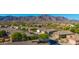 Mountain views from this home and community near desert landscape at 4297 S Pony Rider Trl, Gold Canyon, AZ 85118