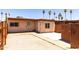 Backyard featuring concrete and palm trees at 4625 W Thomas Rd # 50, Phoenix, AZ 85031