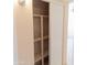 Storage closet with adjustable shelving and sliding doors at 4625 W Thomas Rd # 50, Phoenix, AZ 85031