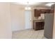 Bright kitchen featuring a neutral color palette, stone countertops, and a new stainless steel fridge at 4625 W Thomas Rd # 50, Phoenix, AZ 85031