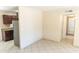 Open floor plan that seamlessly connects the kitchen and living areas at 4625 W Thomas Rd # 50, Phoenix, AZ 85031