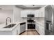Well-equipped kitchen with stainless appliances, quartz counters, and modern fixtures at 5303 N 7Th St # 326, Phoenix, AZ 85014