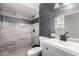 Bathroom featuring updated shower and vanity at 617 E Calle Adobe Ln, Goodyear, AZ 85338