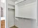 Walk-in closet with built-in shelving and plenty of room for storage at 625 W Douglas Ave, Gilbert, AZ 85233
