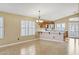 Charming kitchen with breakfast bar, plenty of light, and a double-door entry to an outdoor space at 625 W Douglas Ave, Gilbert, AZ 85233