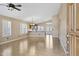 Inviting living room with tile flooring, and an open floor plan into the kitchen and dining area at 625 W Douglas Ave, Gilbert, AZ 85233