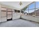 Bright sunroom with views of the fenced backyard at 625 W Douglas Ave, Gilbert, AZ 85233
