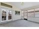 Spacious sunroom with access to the backyard and covered patio at 625 W Douglas Ave, Gilbert, AZ 85233