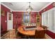 Inviting dining room featuring elegant wall decor, a chandelier, and ample natural light at 6255 E Crocus Dr, Scottsdale, AZ 85254