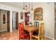 Cozy dining room featuring wooden table and chairs with decorative accents at 6255 E Crocus Dr, Scottsdale, AZ 85254