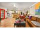 Charming living room featuring rustic accents, colorful decor, and comfortable seating at 6255 E Crocus Dr, Scottsdale, AZ 85254