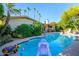 Backyard pool, patio, and lush landscaping create a serene and private outdoor retreat at 6255 E Crocus Dr, Scottsdale, AZ 85254