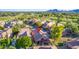 Aerial view of the home showcasing proximity to the golf course and mature trees at 7525 E Gainey Ranch Rd # 164, Scottsdale, AZ 85258