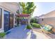 Charming back patio with gravel landscaping, covered seating area and relaxing ambiance at 7525 E Gainey Ranch Rd # 164, Scottsdale, AZ 85258