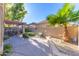 Spacious back patio with lounge seating and views of well manicured desert landscaping at 7525 E Gainey Ranch Rd # 164, Scottsdale, AZ 85258