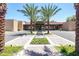 Community building with mature shade trees and verdant landscaping at 7525 E Gainey Ranch Rd # 164, Scottsdale, AZ 85258