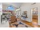 Bright living space with high ceilings, large windows, and comfortable seating arrangements at 7525 E Gainey Ranch Rd # 164, Scottsdale, AZ 85258