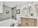 Beautiful bathroom with tub, shower, modern vanity, and upgraded fixtures at 7835 N 21St Dr, Phoenix, AZ 85021