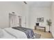 Relaxing bedroom with wood-look floors, bench, and decor at 7835 N 21St Dr, Phoenix, AZ 85021