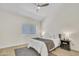 Comfortable bedroom features wood-look floors, ceiling fan, and neutral colors at 7835 N 21St Dr, Phoenix, AZ 85021