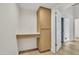 Hallway featuring extra storage and a door to the exterior at 7835 N 21St Dr, Phoenix, AZ 85021